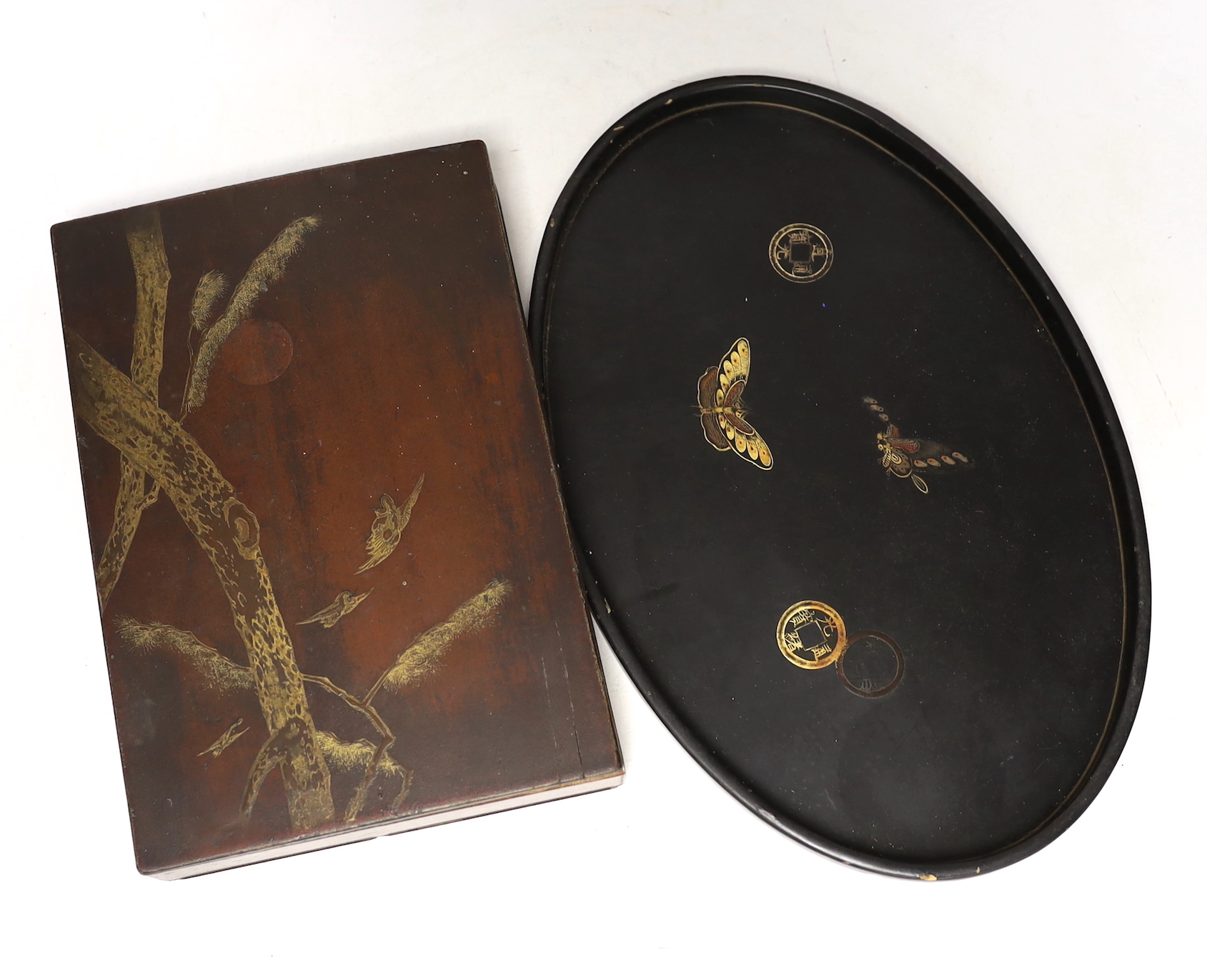 A Japanese lacquer box, small oval tray and a panel, 39.5 x 24.5cm